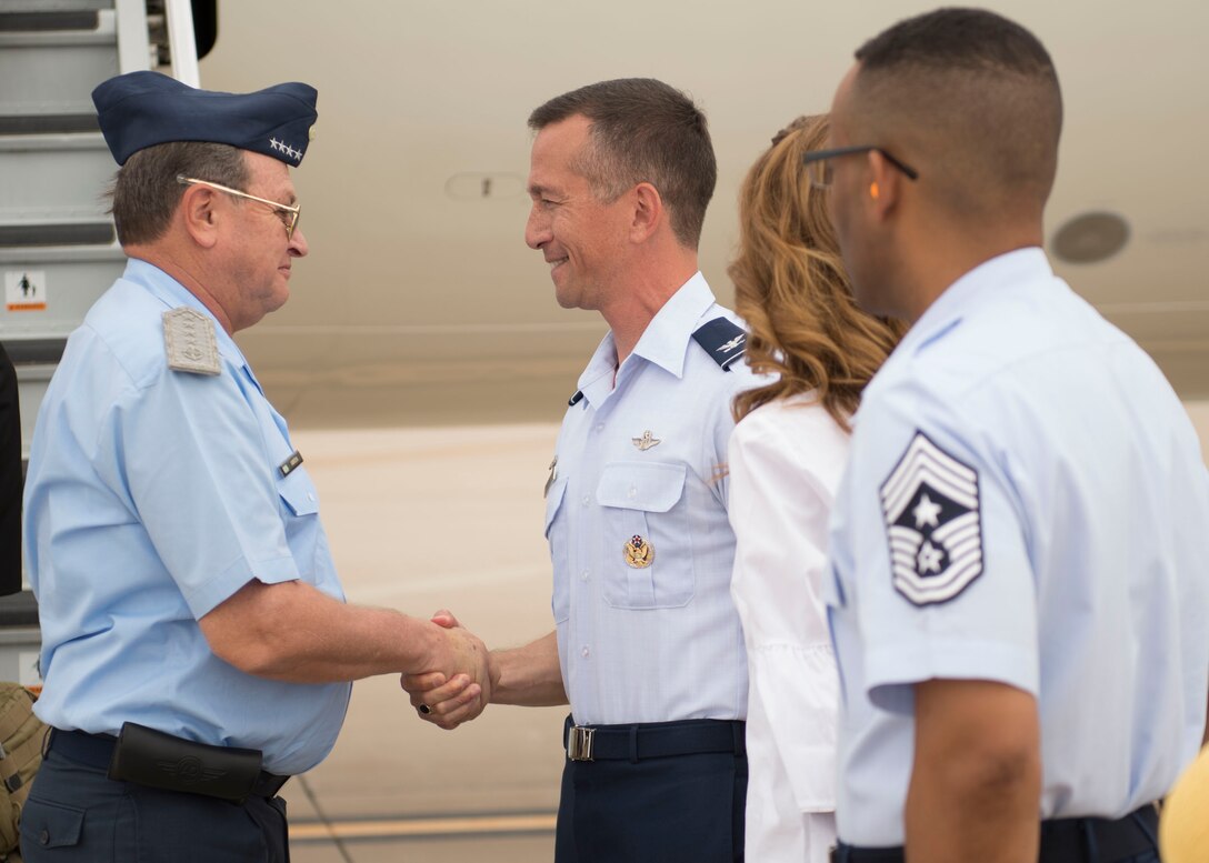 Col. Houston Cantwell, 49th Wing commander, greets Brig. Gen. Enrique Amrein, Argentine air force chief of staff, as he arrives for tour of Holloman Air Force Base, N.M., July 20, 2017. While at Holloman, Amrein learned about the remotely piloted aircraft training program and what pilots, sensor operators and maintainers experience during their time here. (U.S. Air Force photo by Senior Airman Chase Cannon)