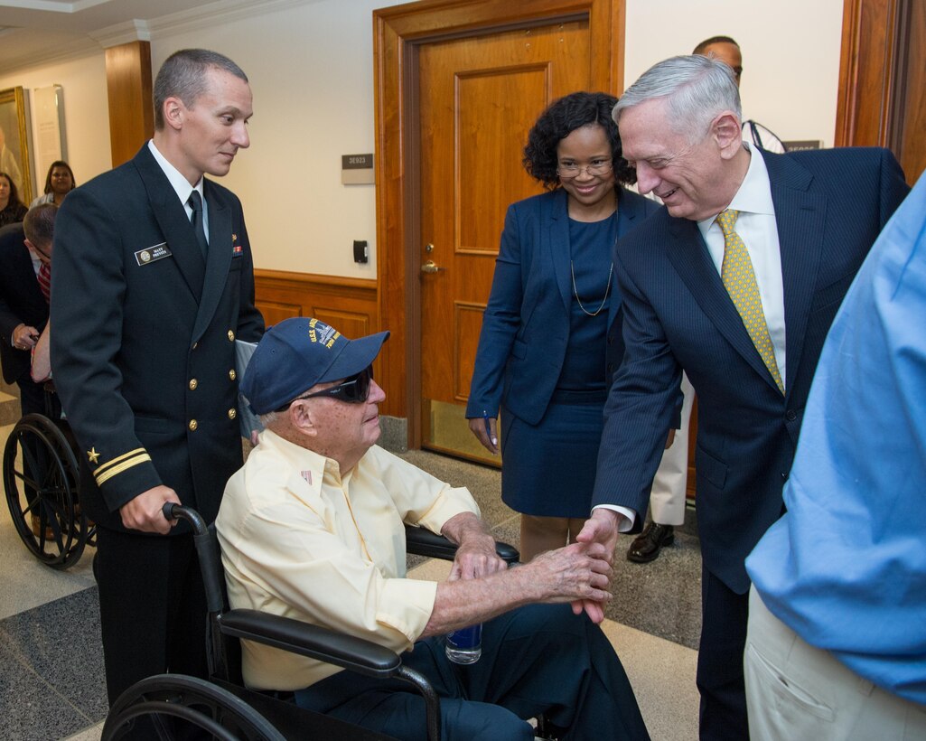 Defense Secretary Jim Mattis speaks with one of three survivors of the USS Arizona during their visit to the the Pentagon, July 21, 2017. DoD photo by Air Force Staff Sgt. Jette Carr