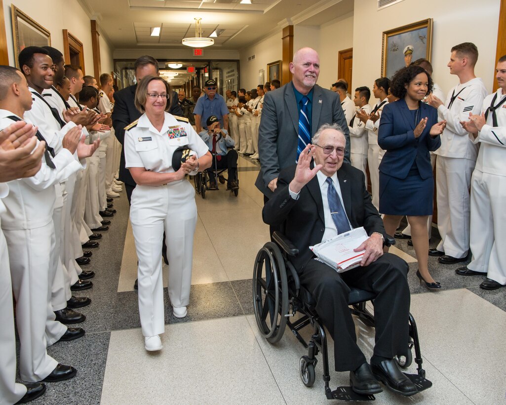 Survivors of the USS Arizona receive cheers as they tour the Pentagon, July 21, 2017. DoD photo by Air Force Staff Sgt. Jette Carr