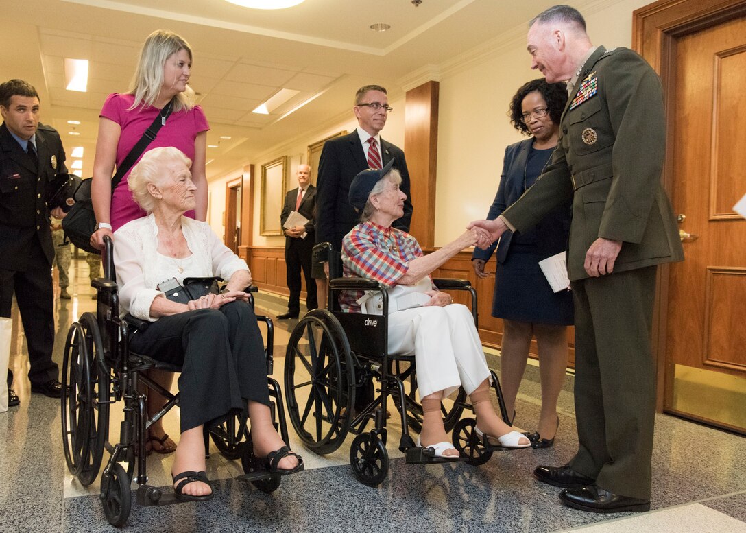 Family members of the survivors of the USS Arizona greet Marine Corps. Gen. Joe Dunford, chairman of the Joint Chiefs of Staff, and other leaders at the Pentagon, July 21, 2017. DoD photo by Navy Petty Officer 2nd Class Dominique A. Pineiro