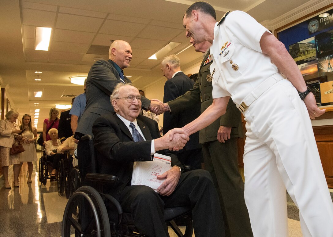 USS Arizona survivor Lauren Bruner greets Navy Adm. John Richardson, chief of naval operations at the Pentagon, July 21, 2017. DoD photo by Navy Petty Officer 2nd Class Dominique A. Pineiro