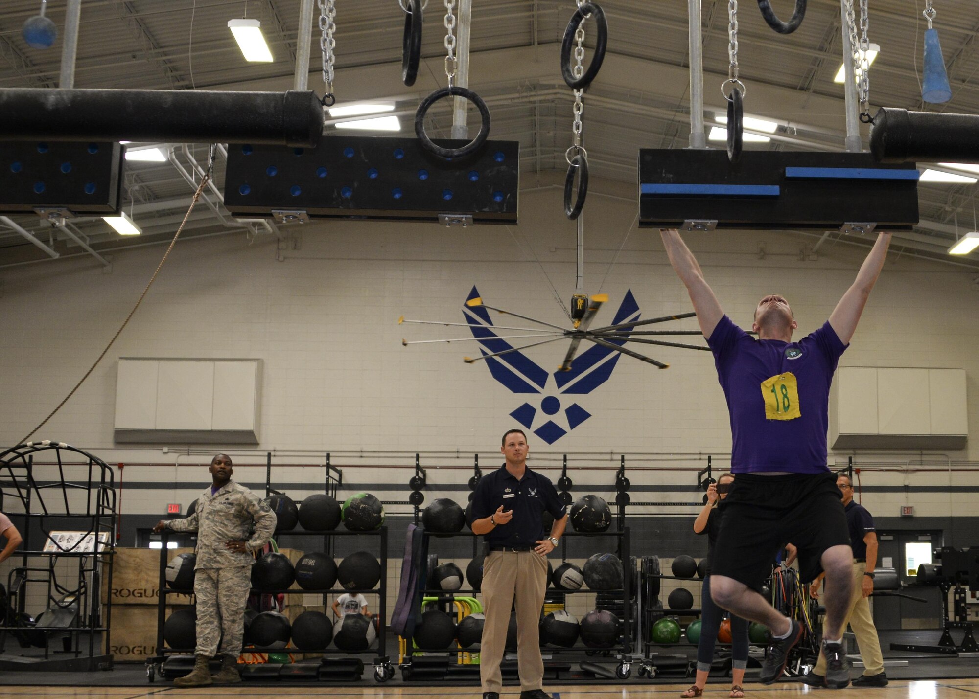 U.S. Air Force Master Sgt. Jonathan McClure, 355th Force Support Squadron first sergeant, begins the Alpha Warrior Challenge at Davis-Monthan Air Force Base, Ariz., July 21, 2017. The top three male and female performers received a variety of prizes such as complimentary lunch certificates for Club Ironwood and sporting goods. (U.S. Air Force photo by Airman 1st Class Giovanni Sims)