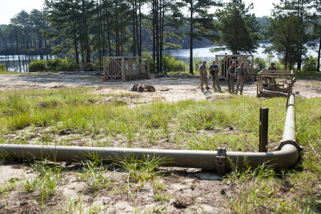 U.S. Army Reserve Soldiers with the 728th Quartermaster Company, Fremont, Neb., operate an
Inland Pipeline Distribution System during QLLEX 2017, July 21, at Fort Bragg, NC. QLLEX, short for Quartermaster Liquid Logistics Exercise, is the U.S. Army Reserve’s premier readiness exercise for fuel and water distribution. This year’s QLLEX is not only a full demonstration of the capability, combat-readiness, and lethality of America’s Army Reserve to put fuel and water where it is needed most – in the vehicles and hands of the war-fighter and maneuver units – but it also further exercises the interoperability of the U.S. Army Reserve alongside active Army and British Army logisticians. (U.S. Army Reserve photo by Timothy L. Hale) (Released)