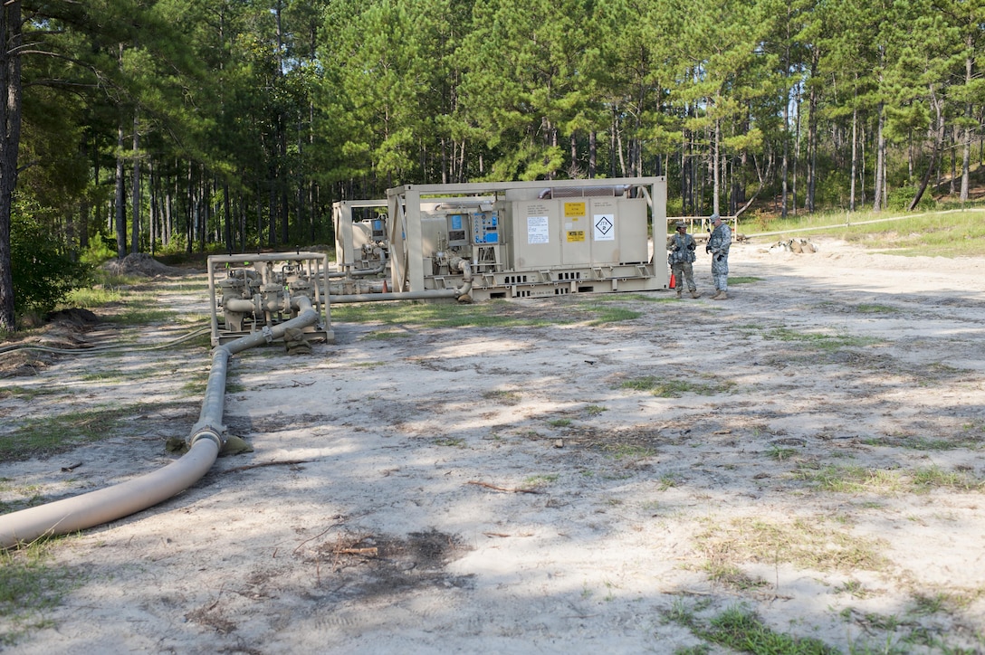 U.S. Army Reserve Soldiers with the 728th Quartermaster Company, Fremont, Neb., operate a pump on the Inland Pipeline Distribution System during QLLEX 2017, July 21, at Fort Bragg, NC. QLLEX, short for Quartermaster Liquid Logistics Exercise, is the U.S. Army Reserve’s premier readiness exercise for fuel and water distribution. This year’s QLLEX is not only a full demonstration of the capability, combat-readiness, and lethality of America’s Army Reserve to put fuel and water where it is needed most – in the vehicles and hands of the war-fighter and maneuver units – but it also further exercises the interoperability of the U.S. Army Reserve alongside active Army and British Army logisticians. (U.S. Army Reserve photo by Timothy L. Hale) (Released)