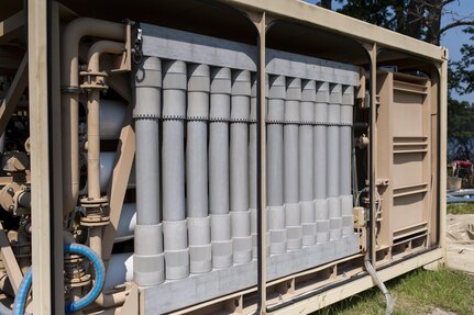 The reverse osmosis process on a Tactical Water Purification System (TWPS) during QLLEX 2017, July 21, at Fort Bragg, NC. QLLEX, short for Quartermaster Liquid Logistics Exercise, is the U.S. Army Reserve’s premier readiness exercise for fuel and water distribution. This year’s QLLEX is not only a full demonstration of the capability, combat-readiness, and lethality of America’s Army Reserve to put fuel and water where it is needed most – in the vehicles and hands of the war-fighter and maneuver units – but it also further exercises the interoperability of the U.S. Army Reserve alongside active Army and British Army logisticians. (U.S. Army Reserve photo by Timothy L. Hale) (Released)