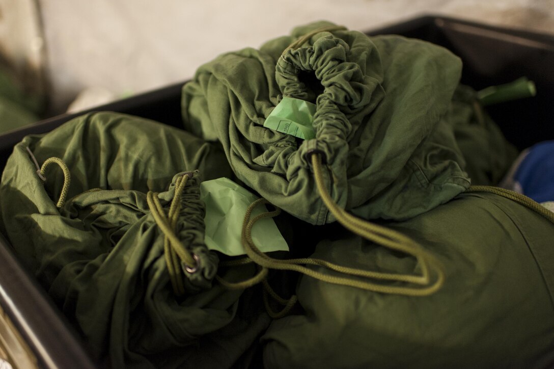 Clean laundry is ready for pick up thanks to U.S. Army Reserve laundry and bath Soldiers from the 275th Quartermaster Battalion, Fort Pickett, Va.,  during QLLEX 2017, July 21, at Fort Bragg, NC. QLLEX, short for Quartermaster Liquid Logistics Exercise, is the U.S. Army Reserve’s premier readiness exercise for fuel and water distribution. This year’s QLLEX is not only a full demonstration of the capability, combat-readiness, and lethality of America’s Army Reserve to put fuel and water where it is needed most – in the vehicles and hands of the war-fighter and maneuver units – but it also further exercises the interoperability of the U.S. Army Reserve alongside active Army and British Army logisticians. (U.S. Army Reserve photo by Timothy L. Hale) (Released)