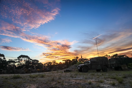 A sunrise hangs over the horizon at the Jungle Warfare Training Center, aboard Camp Gonsalves, Okinawa, Japan, July 13, 2017. The Jungle Warfare Training Center provides individual and unit level training to increase survivability and lethality while operating in a jungle environment. (U.S. Marine Corps photo by Cpl. Aaron S. Patterson)