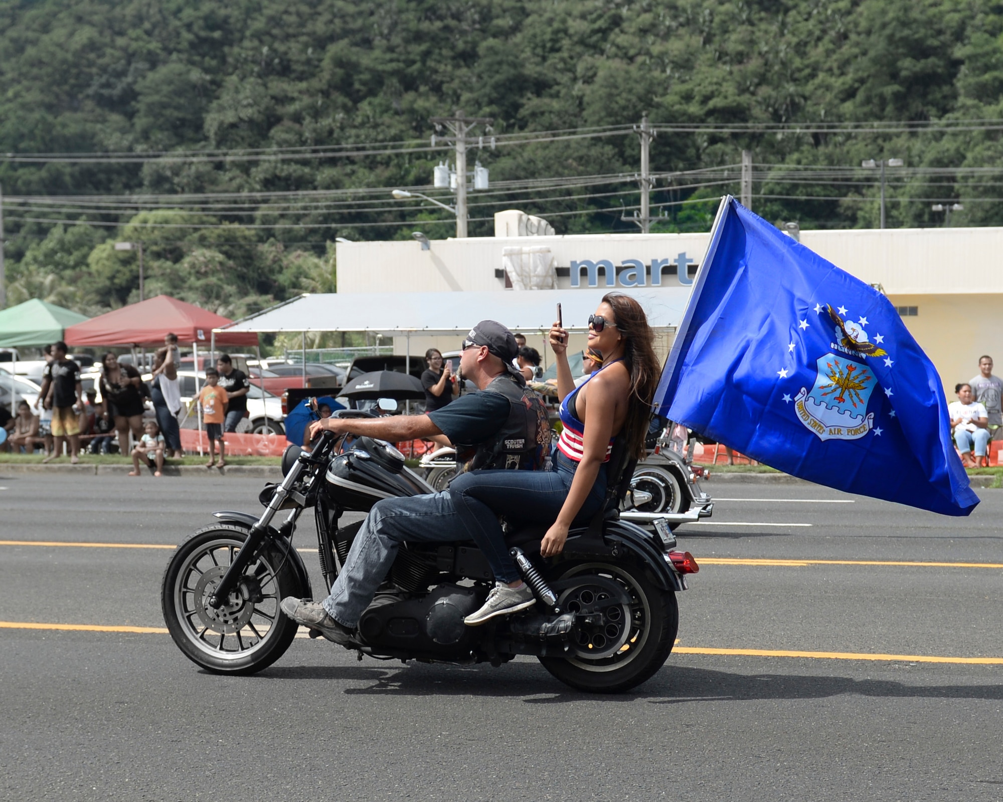 U.S Service members and local citizens participate in the 73rd Guam Liberation Day parade July 21, 2017, in Hagåtña, Guam. Liberation Day is celebrated every year on July 21 to mark the day Guam was liberated by U.S. armed forces from Japanese occupation during World War II. (U.S. Air Force photo by Airman 1st Class Gerald R. Willis)