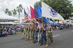 U.S. service members march during the 73rd Guam Liberation Day parade July 21, 2017, in Hagåtña, Guam. The parade commemorated 73 years since U.S. armed forces liberated the island from Japanese occupation. During World War II, Japan seized Guam on December 10, 1941, and on July 21, 1944, the U.S. armed forces liberated the island. (U.S. Air Force photo by Airman 1st Class Christopher Quail)