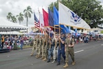 U.S. service members march during the 73rd Guam Liberation Day parade July 21, 2017, in Hagåtña, Guam. The parade commemorated 73 years since U.S. armed forces liberated the island from Japanese occupation. During World War II, Japan seized Guam on December 10, 1941, and on July 21, 1944, the U.S. armed forces liberated the island. (U.S. Air Force photo by Airman 1st Class Christopher Quail)