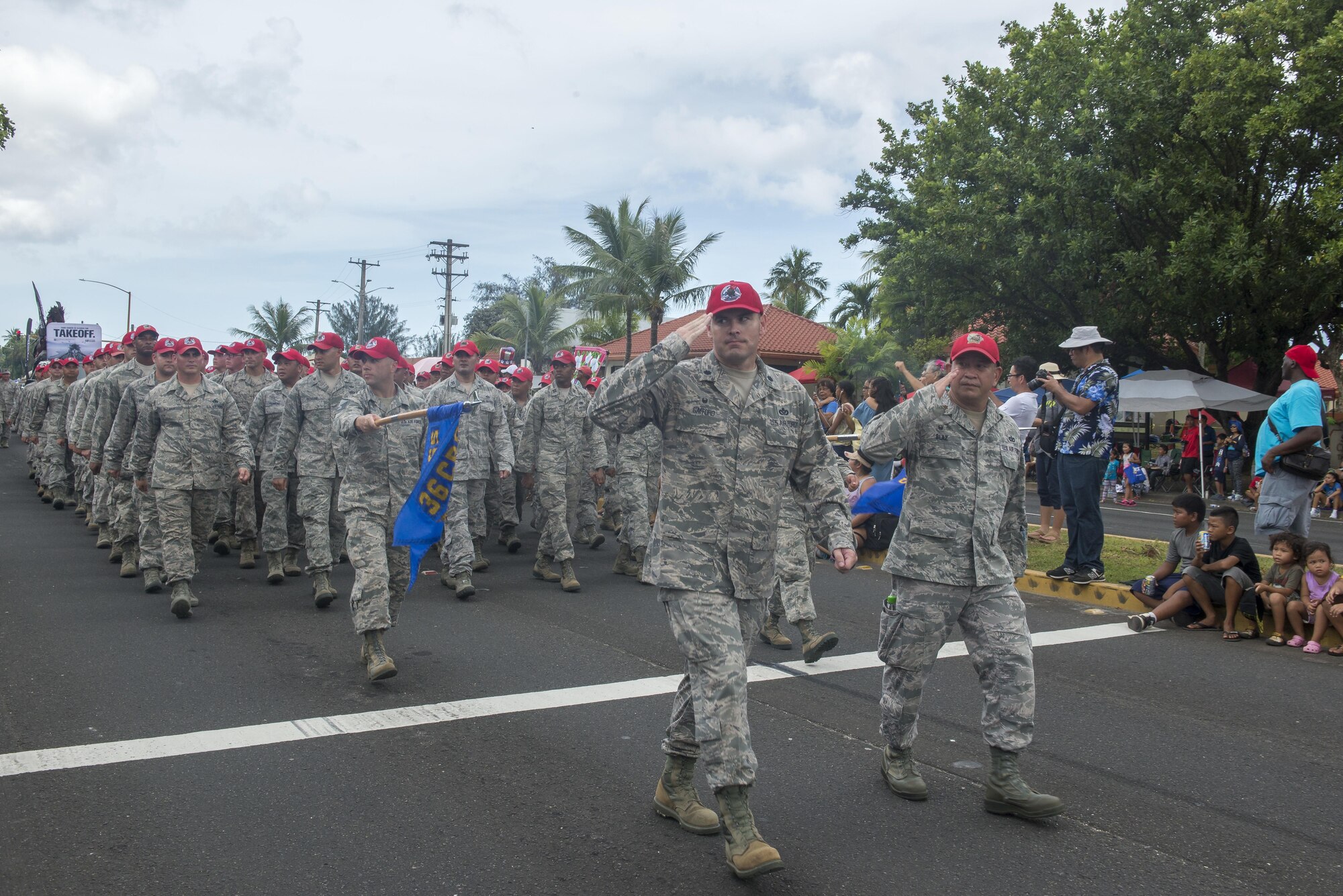 U.S. Airmen with the 554th RED HORSE Squadron, march in the 73rd Guam Liberation Day parade July 21, 2016, in Hagåtña, Guam. The parade commemorated 73 years since U.S. armed forces liberated the island from Japanese occupation. During World War II, Japan seized Guam on December 10, 1941, and on July 21, 1944, the U.S. armed forces liberated the island. (U.S. Air Force photo by Airman 1st Class Christopher Quail)