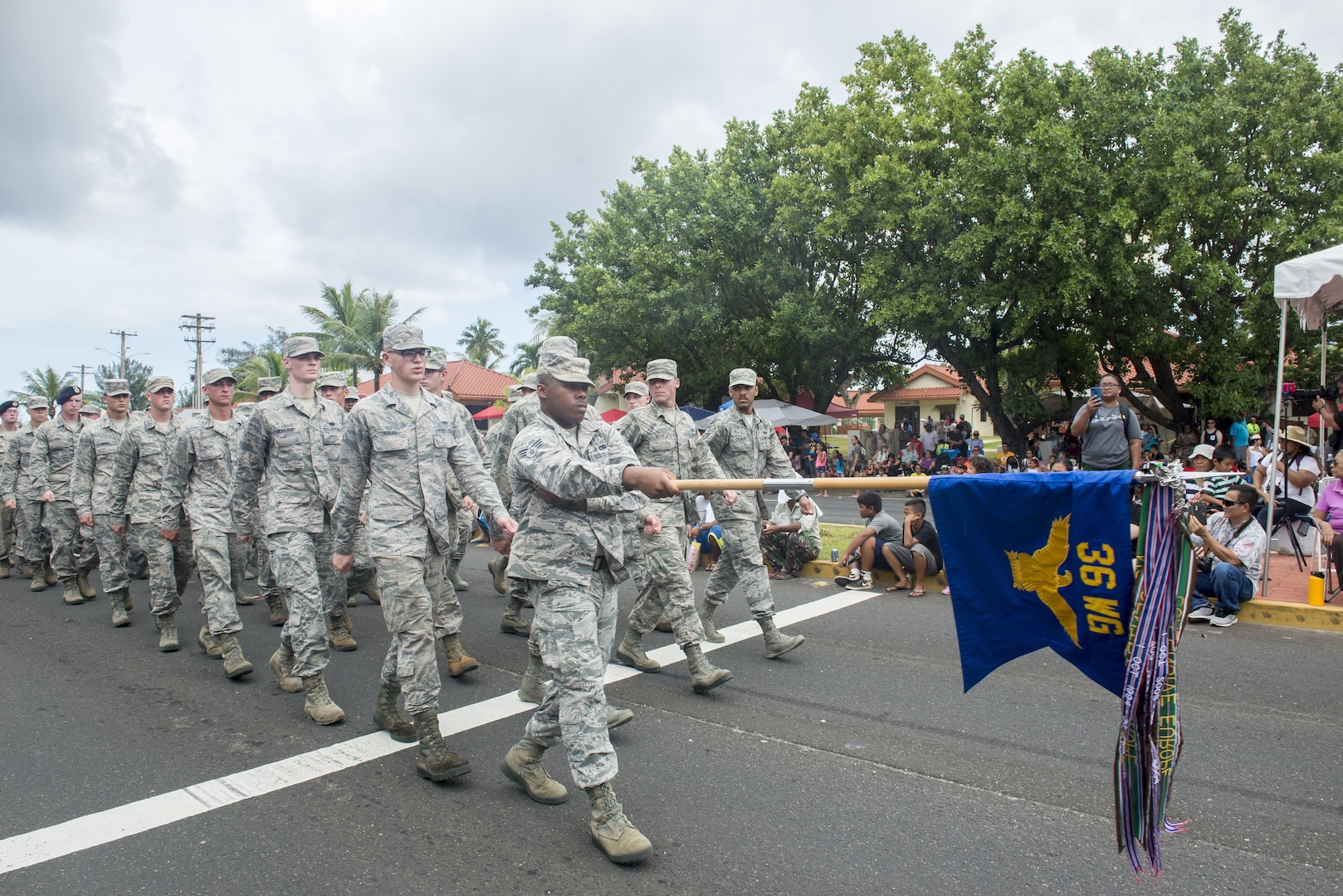 U.S. Airmen from the 36th Wing march in the 73rd Guam Liberation Day parade July 21, 2017, in Hagåtña, Guam. The parade commemorated 73 years since U.S. armed forces liberated the island from Japanese occupation. During World War II, Japan seized Guam on December 10, 1941, and on July 21, 1944, the U.S. armed forces liberated the island. (U.S. Air Force photo by Airman 1st Class Christopher Quail)