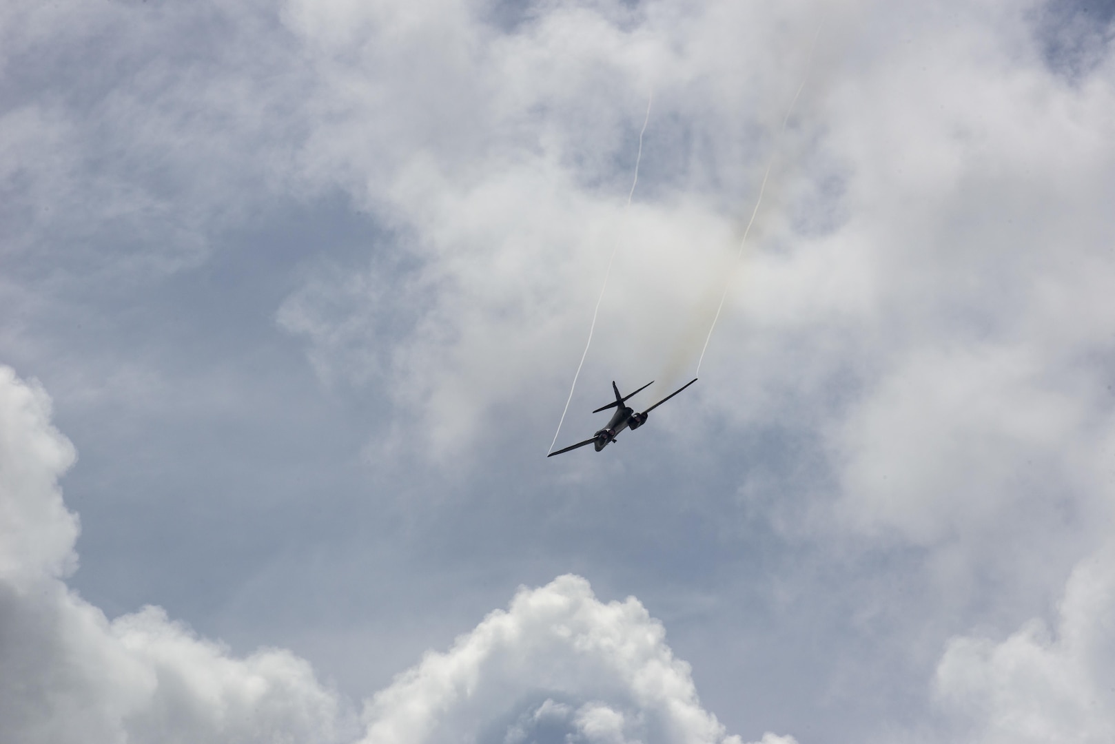 A B1-B Lancer assigned to the 9th Expeditionary Bomb Squadron flies over the 73rd Guam Liberation Day parade July 21, 2017, in Hagåtña, Guam. The parade commemorated 73 years since U.S. armed forces liberated the island from Japanese occupation. During World War II, Japan seized Guam on December 10, 1941, and on July 21, 1944, the U.S. armed forces liberated the island. (U.S. Air Force photo by Airman 1st Class Christopher Quail)