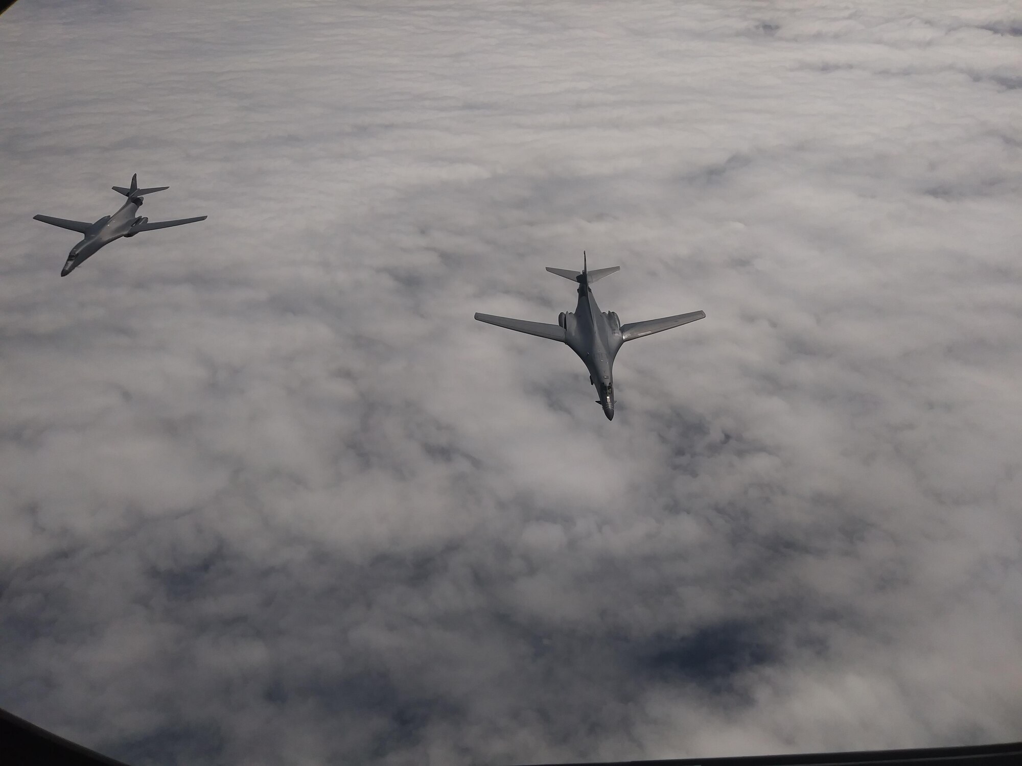 U.S. Air Force B-1B Lancers assigned to the 9th Expeditionary Bomb Squadron, deployed from Dyess Air Force Base, Tx., fly over Shoalwater Field Training Area, Australia July 20, 2017. The lancers conducted bilateral training mission with Royal Australian Air Force Joint Terminal Attack Controllers (JTACs), July 18 as part of Talisman Saber 17 a training exercise designed to maximize combined training opportunities and conduct maritime preposition and logistics operations in the Pacific. (U.S. Air Force photo)