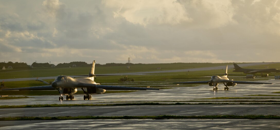 U.S. Air Force B-1B Lancers assigned to the 9th Expeditionary Bomb Squadron, deployed from Dyess Air Force Base, Tx., taxi down a flightline July 20, 2017, at Andersen Air Force Base, Guam. The lancers conducted bilateral training mission with Royal Australian Air Force Joint Terminal Attack Controllers (JTACs), July 20 as part of Talisman Saber 17 a training exercise designed to maximize combined training opportunities and conduct maritime preposition and logistics operations in the Pacific. (U.S. Air Force photo by Staff Sgt. Joshua Smoot)