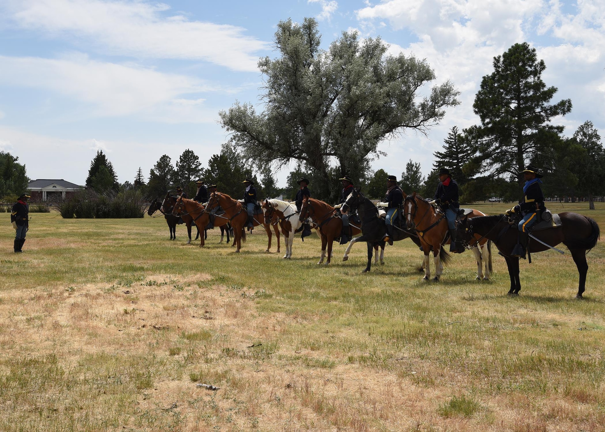 Buffalo Soldier re-enactors perform an inspection during Fort D.A. Russell Days at
F.E. Warren Air Force Base, Wyo., July 23, 2017. The Buffalo Soldiers celebrate their 151st anniversary this year, while the base and city of Cheyenne celebrate their 150th. (U.S. Air Force photo by Glenn
S. Robertson)

