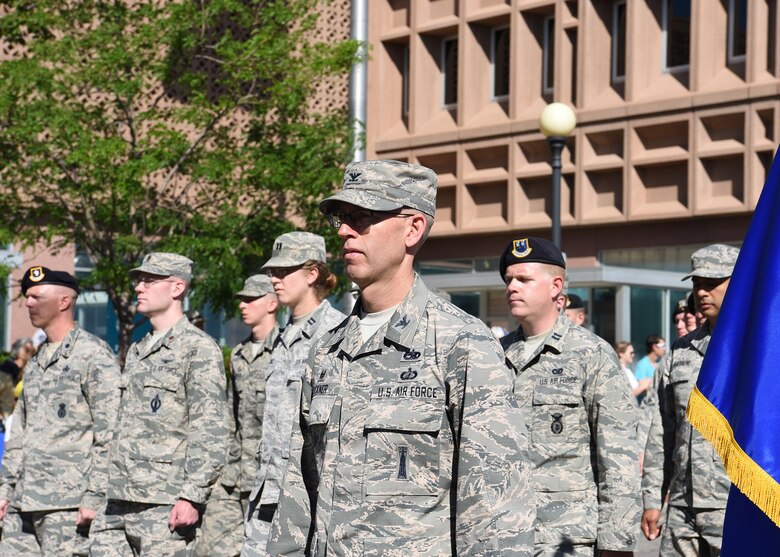 Col. Greg Buckner, 90th Maintenance Group commander, leads a formation of Airmen from the 90th Missile Wing during the 121st Cheyenne Frontier Days grand opening parade in Cheyenne, Wyo. July 22, 2017. Buckner has been in the Air Force since 1994 and arrived at F.E. Warren Air Force Base in 2016. This year marks the 150th anniversary of F.E. Warren Air Force Base and the city of Cheyenne. The two communities came together to celebrate during the 121st CFD rodeo and festival. (U.S. Air Force photo by Airman 1st Class Braydon Williams)