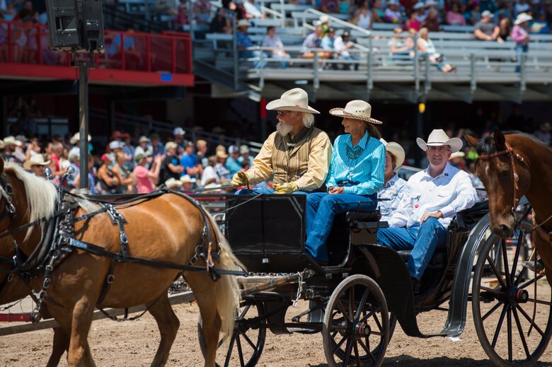 U.S. Air Force Gen. John E. Hyten, U.S. Strategic Command commander rides into Frontier Park for the Cheyenne Frontier Days grand entrance ceremony in Cheyenne, Wyo., July 22, 2017. Hyten’s grand entrance marks the official start of the two week-long event. This year marks the 150th anniversary of F.E. Warren Air Force Base and the city of Cheyenne. The two communities came together to celebrate during the 121st CFD rodeo and festival. (U.S. Air Force photo by Staff Sgt. Christopher Ruano)
