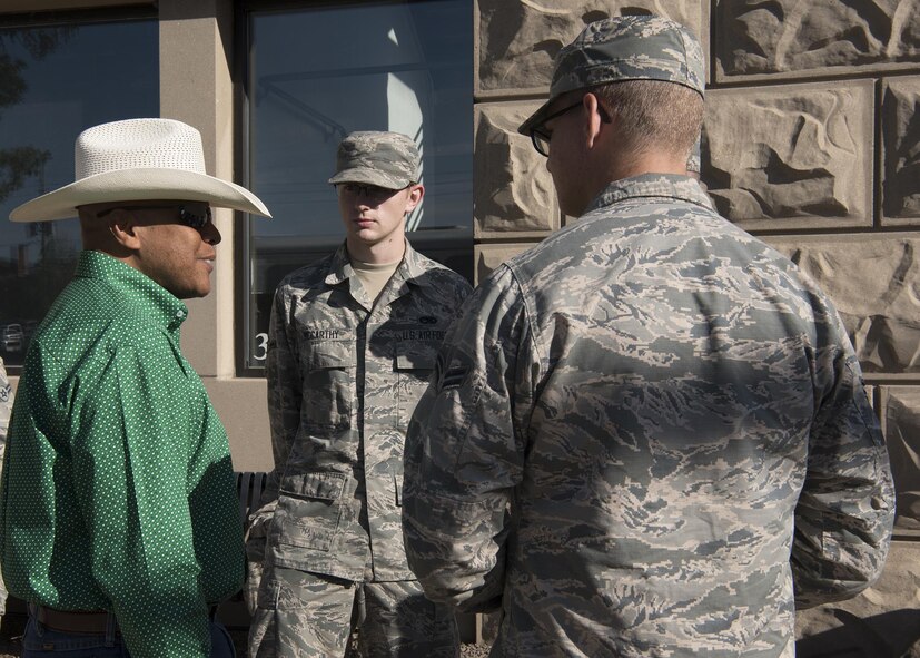 Maj. Gen. Anthony Cotton, 20th Air Force commander, speaks with Airmen before the Cheyenne Frontier Days opening grand parade in Cheyenne, Wyo., July 22, 2017. Air Force leadership is invited to march in the parade to show their support to the community. This year marks the 150th anniversary of F.E. Warren Air Force Base and the city of Cheyenne. The two communities came together to celebrate during the 121st CFD rodeo and festival. (U.S. Air Force photo by Staff Sgt. Christopher Ruano)