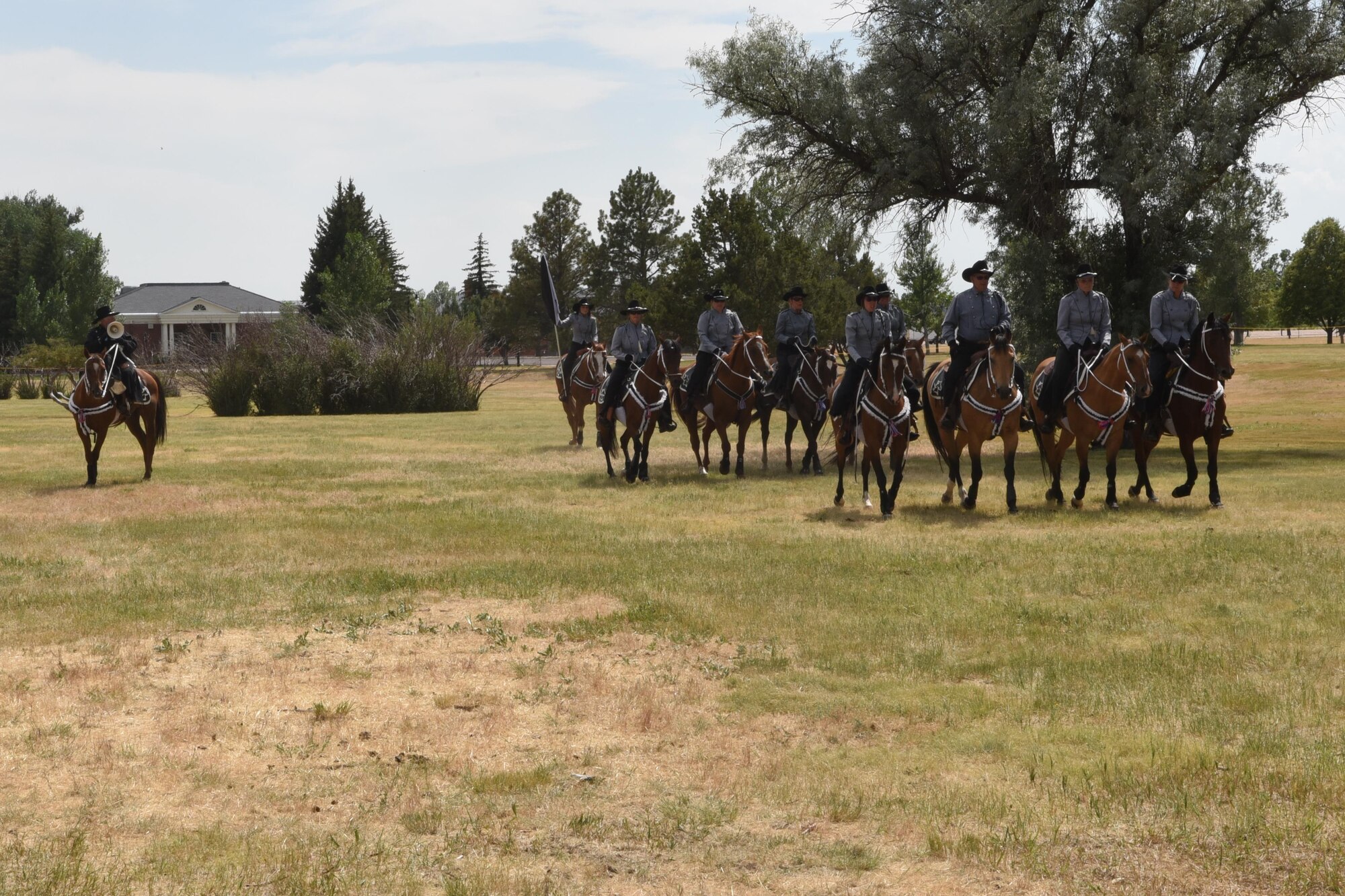 Members of the Trotters Equestrian team perform during Fort D.A. Russell Days, at F.E. Warren Air Force Base, Wyo., July 22, 2017.  The performance is a demonstration of historical cavalry precision riding drills. (U.S. Air Force photo by Terry Higgins)


