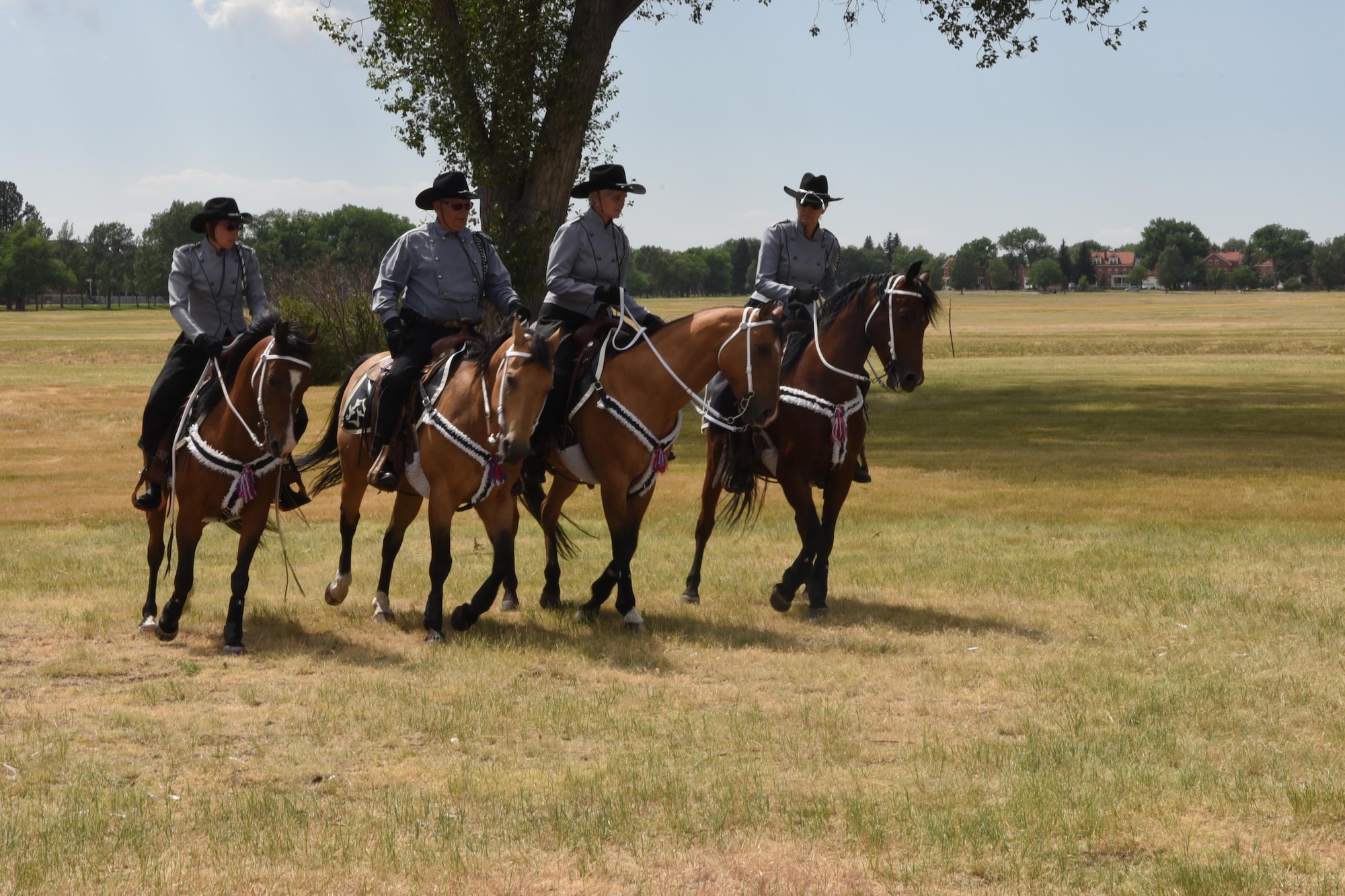 Members of the Trotters Equestrian precision riding team demonstrate their skills during Fort D.A. Russell Days at F.E. Warren Air Force Base, Wyo., July 22, 2017. The Trotters performance is an annual tradition. (U.S. Air Force photo by Terry Higgins)