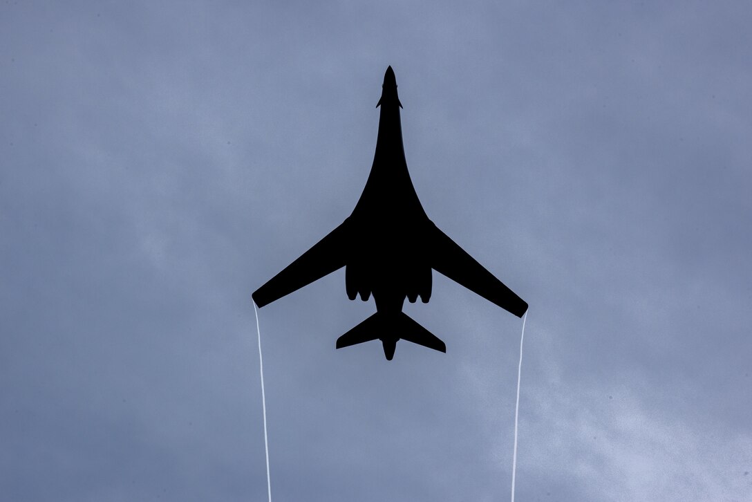 A B1-B Lancer assigned to the 9th Expeditionary Bomb Squadron flies over the 73rd Guam Liberation Day parade July 21, 2017, in Hagåtña, Guam. The parade commemorated 73 years since U.S. armed forces liberated the island from Japanese occupation. During World War II, Japan seized Guam on December 10, 1941, and on July 21, 1944, the U.S. armed forces liberated the island. (U.S. Air Force photo by Airman 1st Class Christopher Quail)