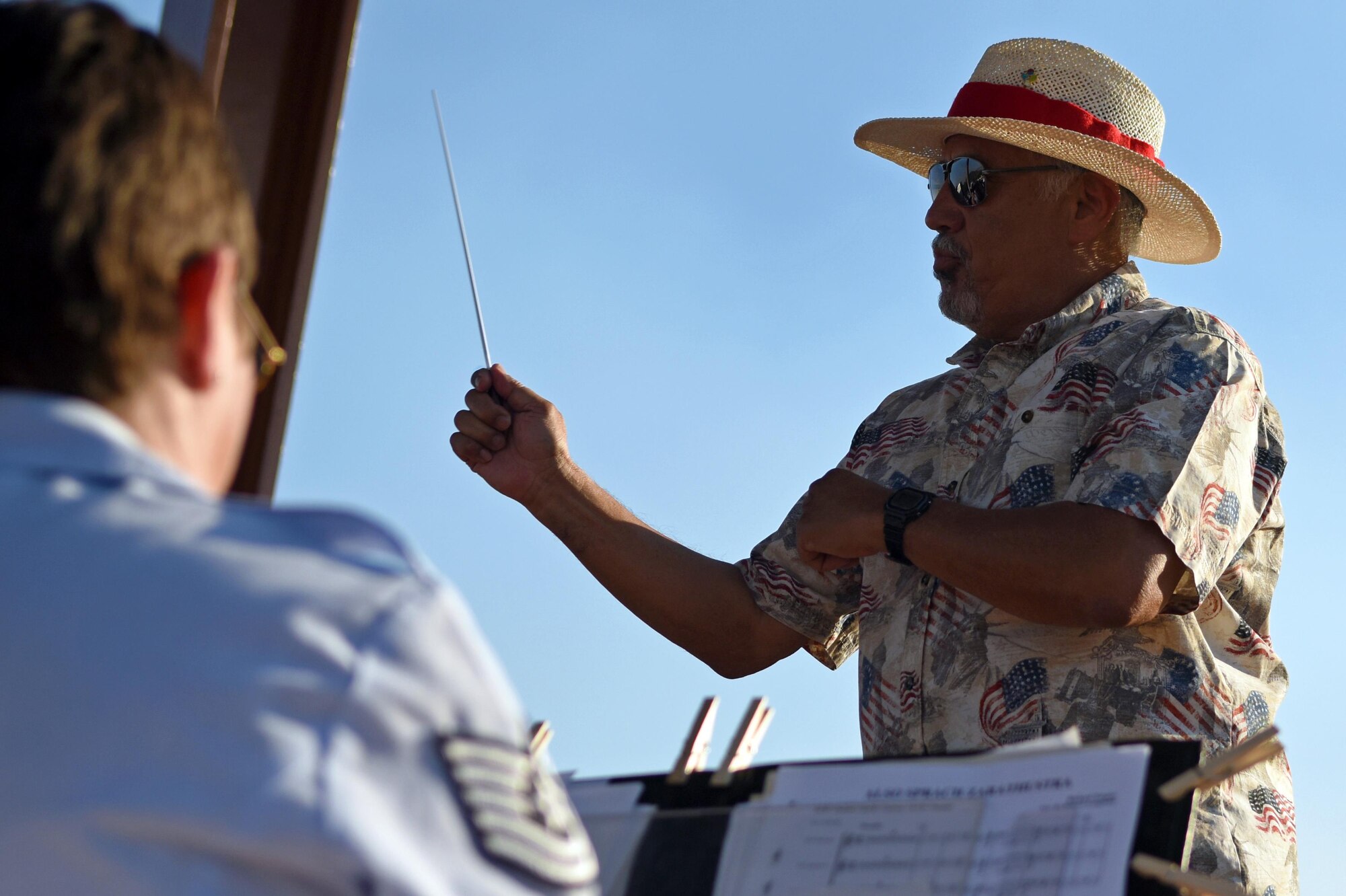 Sandy Moriarty, the mayor of Sedona, NM, guest conducts a piece of music during a performance June 29 at Posse Ground Park. Throughout the show, the band incorporated selections from Star Trek, Star Wars, Guardians of the Galaxy, and Beauty and the Beast, as well as pieces from famous composers William Grant Still and John Phillip Sousa. (Texas Air National Guard photo by Staff Sgt. Kristina Overton)
