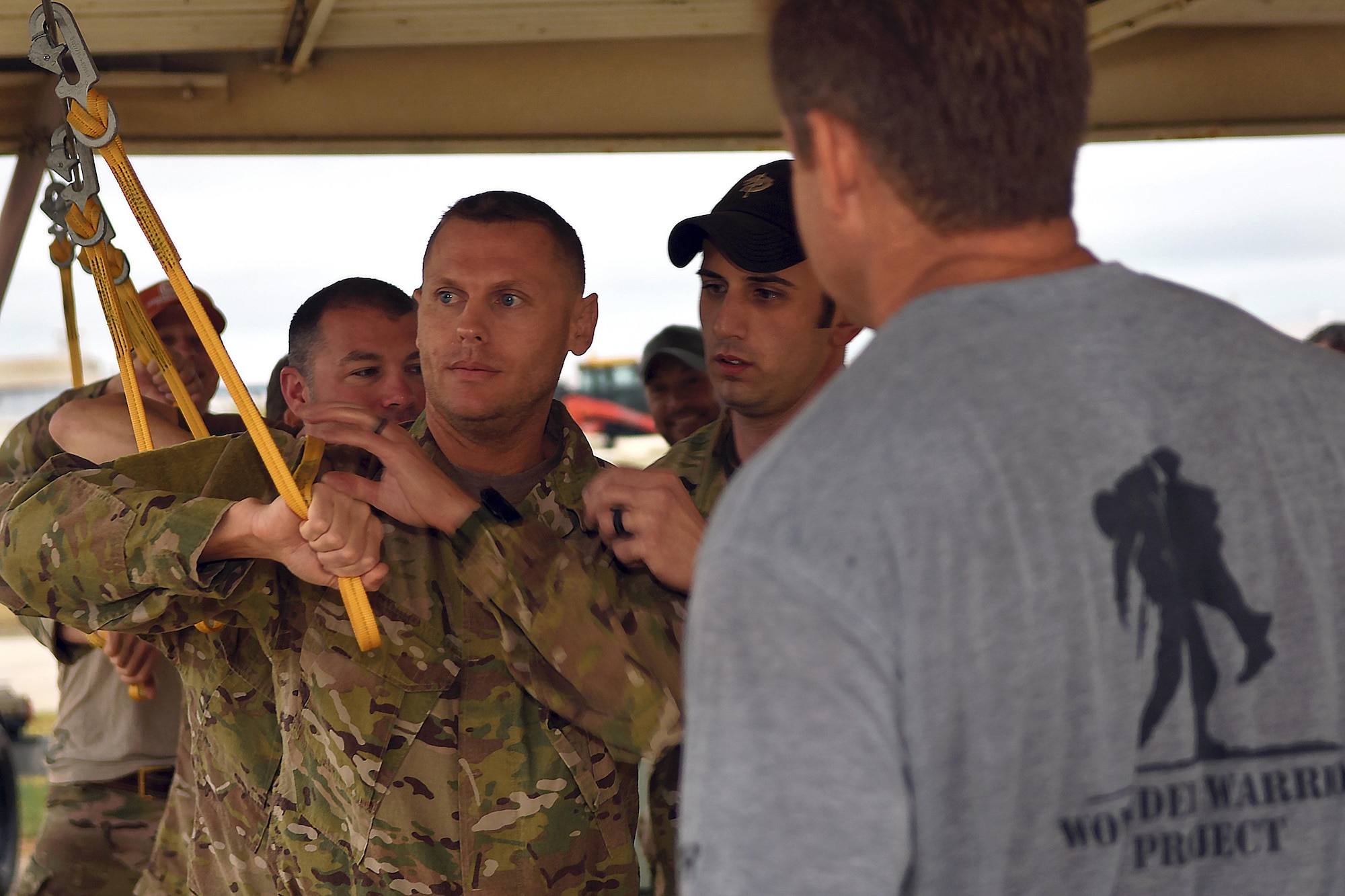 Master Sgt. James Henderson, 181st Weather Flight special operations weatherman, practices safety procedures for exiting an aircraft prior to a deliberate water drop into Lake Worth in Forth Worth, Texas,  May 20, 2017. The jump was part of an exercise to train on tactical skills when operating in hostile and denied territories. (Texas Air National Guard photo by Staff Sgt. Kristina Overton)