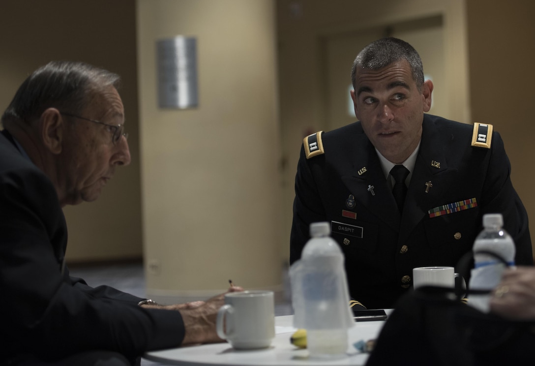 Capt. Doug Daspit (right), U.S. Army Reserve chaplain for the 321st Sustainment Brigade located in Baton Rouge, Louisiana, sits with chaplain endorser, George Paul, after receiving the Chaplain of the Year award during the Reserve Officers Association National Convention in Crystal City, Virginia, July 22, 2017. Daspit was nominated for his response to recent Baton Rouge floods, providing one-on-one pastoral counseling to 38 Soldiers and their affected families. (U.S. Army Reserve photo by Sgt. Audrey Hayes)