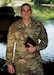 Capt. Doug Daspit, U.S. Army Reserve chaplain for the 321st Sustainment Brigade located in Baton Rouge, Louisiana, poses for a portrait in knee-deep water after receiving the Chaplain of the Year award during the Reserve Officers Association National Convention in Crystal City, Virginia, July 22, 2017. Daspit was nominated for his response to recent Baton Rouge floods, providing one-on-one pastoral counseling to 38 Soldiers and their affected families. (U.S. Army Reserve photo by Sgt. Audrey Hayes)