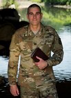 Capt. Doug Daspit, U.S. Army Reserve chaplain for the 321st Sustainment Brigade located in Baton Rouge, Louisiana, poses for a portrait in knee-deep water after receiving the Chaplain of the Year award during the Reserve Officers Association National Convention in Crystal City, Virginia, July 22, 2017. Daspit was nominated for his response to recent Baton Rouge floods, providing one-on-one pastoral counseling to 38 Soldiers and their affected families. (U.S. Army Reserve photo by Sgt. Audrey Hayes)