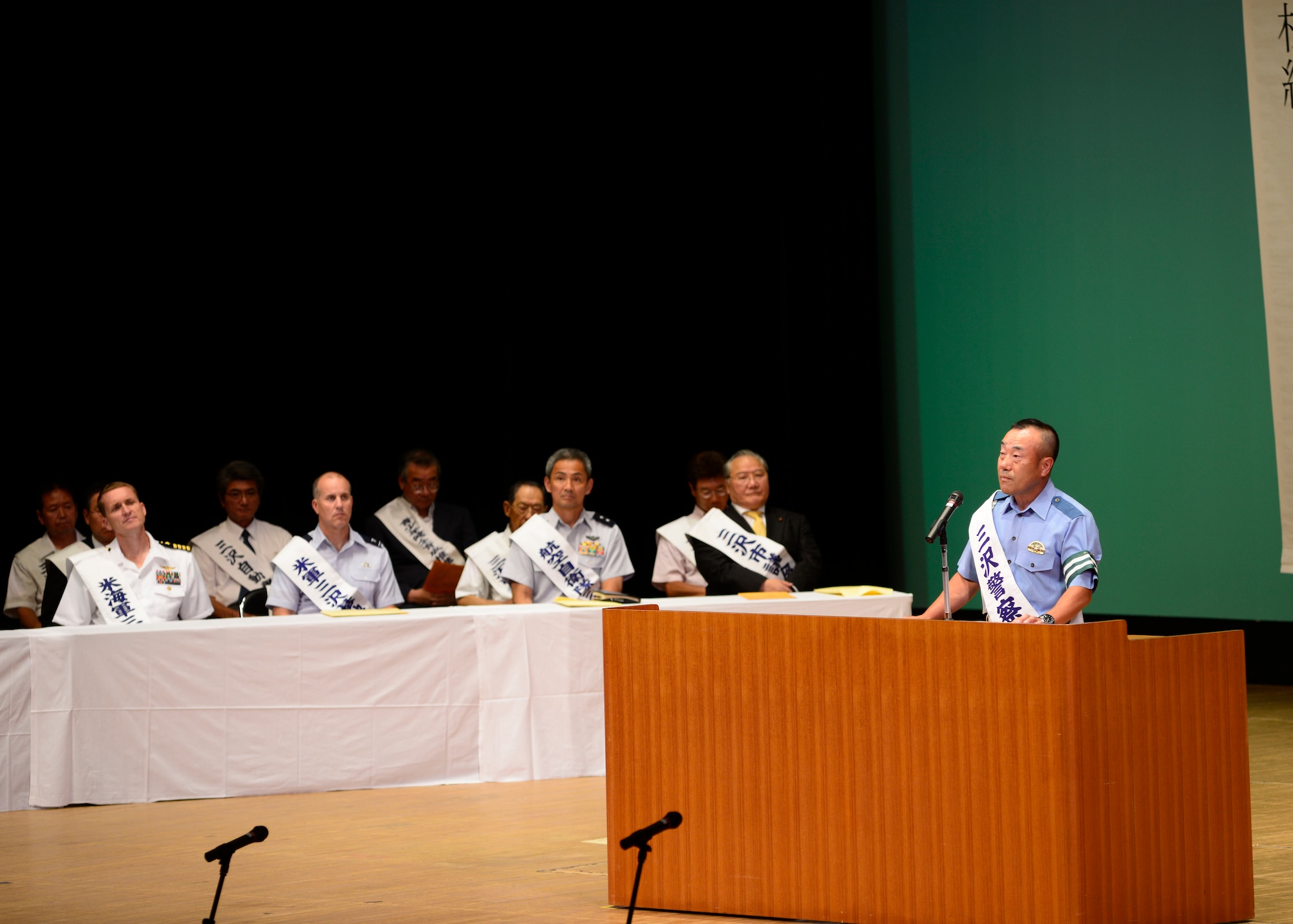 Nobuhiro Izumida, the Misawa City police chief, speaks on behalf of the Misawa City Police during the Prefectural Summer Traffic Safety Campaign 2017, at Misawa City, Japan, July 21, 2017. The event highlighted traffic safety and reminded service members and civilians to take precautionary measures while behind the wheel in order to minimize accidents. (U.S. Navy Photo by Mass Communication Specialist 3rd Class Samuel Bacon)