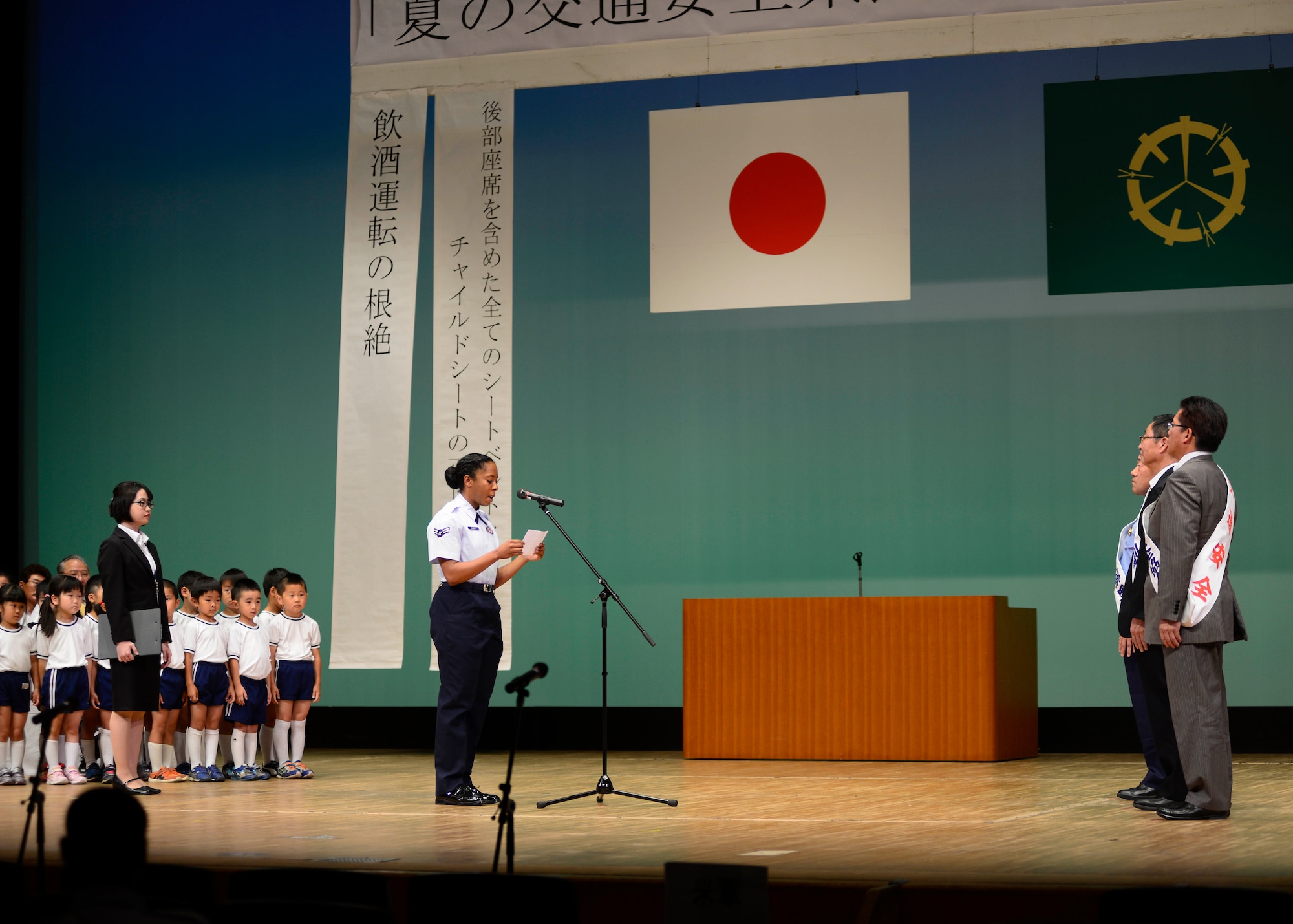 U.S. Air Force Airman 1st Class Sadie Colbert, speaks on behalf of Misawa Air Base at the Prefectural Summer Traffic Safety Campaign 2017, at Misawa City, Japan, July 21, 2017. Several city officials spoke on Misawa’s traffic incidents for the past year, with a total of 140 injuries, two major accidents and two fatalities. (U.S. Navy Photo by Mass Communication Specialist 3rd Class Samuel Bacon)