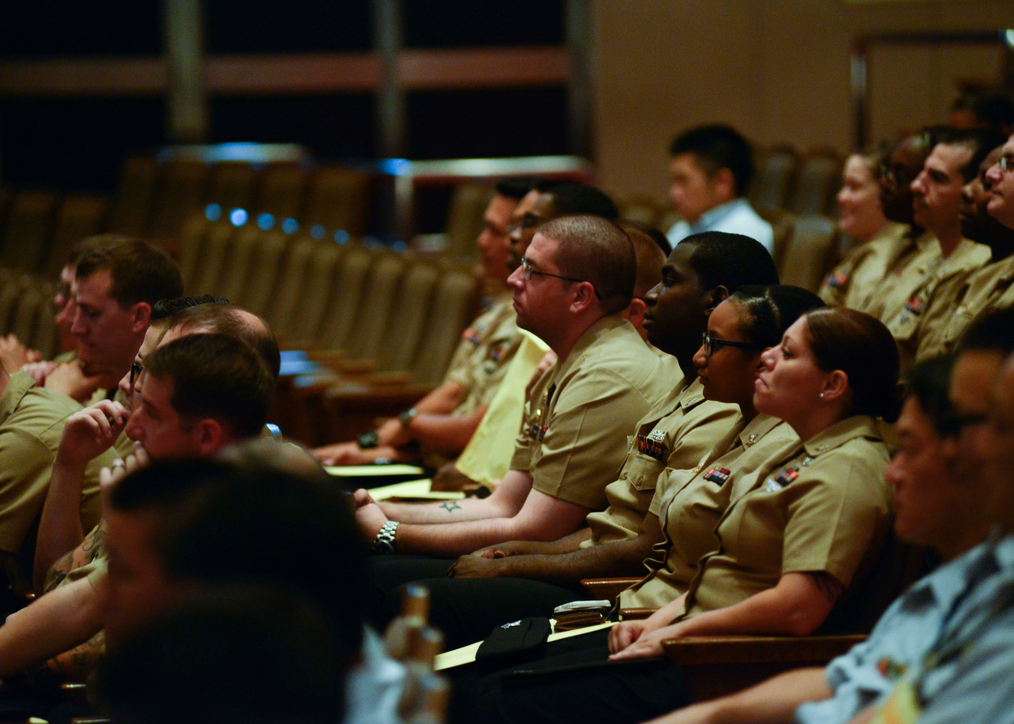 U.S. Navy Sailors listen during the Prefectural Summer Traffic Safety Campaign 2017, at Misawa City, Japan, July 21, 2017. Hundreds of community members and U.S. service members attended the campaign in support of preventing traffic incidents and enjoyed an Edo-period traffic safety play at the end of the campaign, which encouraged members to always follow traffic laws. (U.S. Navy Photo by Mass Communication Specialist 3rd Class Samuel Bacon)