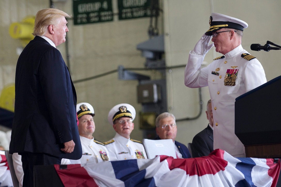 Navy Capt. Richard McCormack, right, commander of the aircraft carrier USS Gerald R. Ford, salutes President Donald J. Trump during the ship's commissioning ceremony at Naval Station Norfolk, Va., July 22, 2017. Navy photo by Petty Officer 3rd Class Gitte Schirrmacher