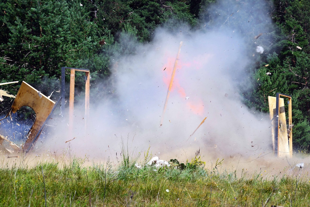 U.S. paratroopers detonate a C4 explosive charge on a door during urban breach training as part of Exercise Rock Knight at Pocek Range in Postonja, Slovenia, July 20, 2017. Army photo by Paolo Bovo
