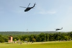 Soldiers with Fort Indiantown Gap’s inaugural Air Assault course rappel from a UH-60 Black Hawk helicopter operated by pilots from the Eastern Army National Guard Aviation Training Site July 20, 2017. T