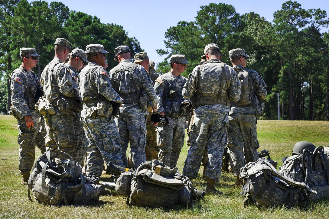 South Carolina Army National Guard members receive a training briefing before participating in the Spur Ride at McCrady Training Center in Eastover, South Carolina, July 14, 2017. Army National Guard photo by Spc. Chelsea Baker