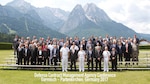 Navy Vice Adm. David Lewis (front row far left), Defense Contract Management Agency director, joined members of the agency's International Directorate and partner-nation officials at the DCMA's 16th Host Nation Conference. The conference provides a forum to discuss quality assurance and contract auditing. (Photo courtesy Edelweiss Lodge and Resort)