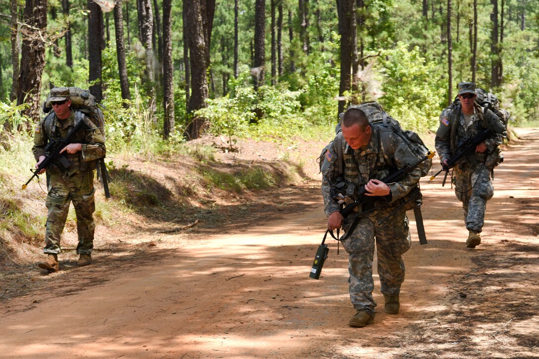South Carolina Army National Guard members participate in a road march during the Spur Ride at McCrady Training Center in Eastover, S.C., July 14, 2017. Army National Guard photo by Spc. Chelsea Baker