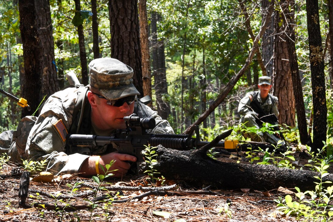 South Carolina Army National Guard members provide security during a patrol while participating in the Spur Ride at McCrady Training Center in Eastover, S.C., July 14, 2017. Army National Guard photo by Spc. Chelsea Baker