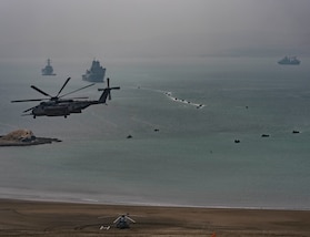 SALINAS, Peru (July 22, 2017) Ships and aircraft representing the 19 nations participating in UNITAS 2017 conduct a joint amphibious landing demonstration. UNITAS is an annual, multi-national exercise that focuses on strengthening our existing regional partnerships and encourages establishing new relationships through the exchange of maritime mission-focused knowledge and expertise during multinational training operations. (U.S. Navy photo by Mass Communication Specialist 2nd Class Bill Dodge/Released)