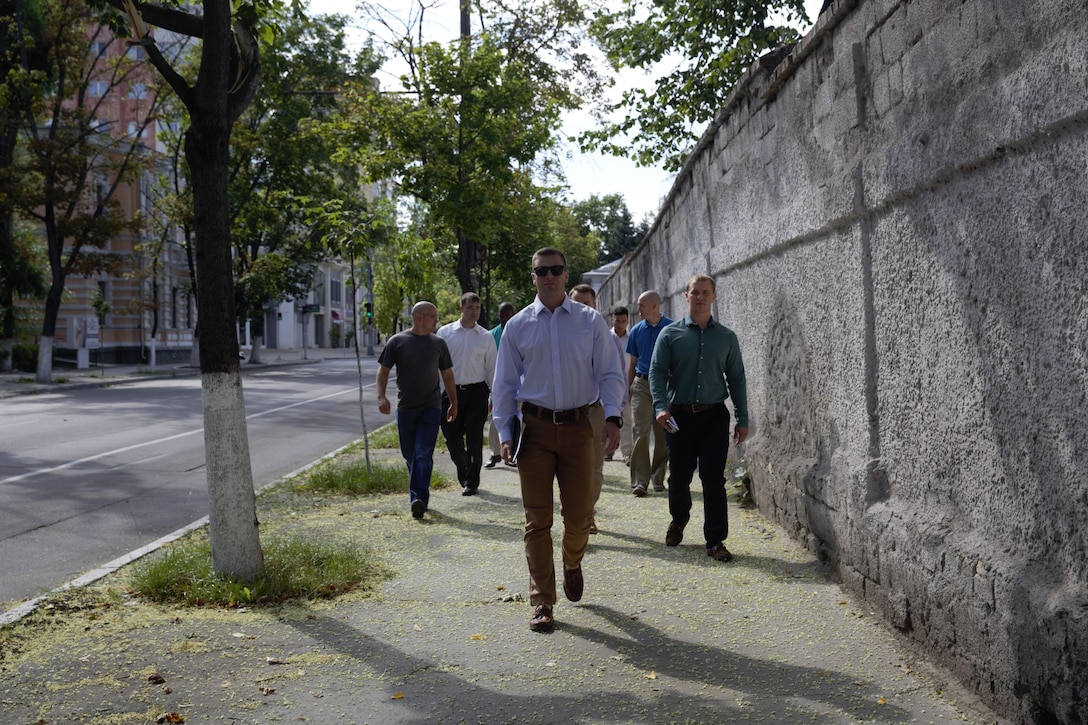 U.S. Marines with Black Sea Rotational Force 17.1, Marine Rotational Force Europe 17.1 and Marine Security Guard detachment tour the adjacent neighborhoods to the U.S. Embassy during an embassy reinforcement exercise in Chisinau, Moldova, July 16, 2017.  Embassy reinforcement exercises improve emergency preparedness. 