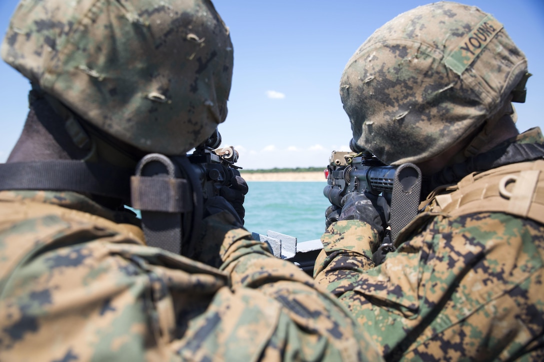 U.S. Marines assigned to the 3rd Battalion, 23rd Marine Regiment, provide security before assaulting a beach using a Turkish Higgins landing boat from the Turkish ship TCG Karamurselbey in the Black Sea during exercise Sea Breeze 2017 in Mykolayivka, Ukraine, July 17, 2017. Marine Corps photo by Staff Sgt. Marcin Platek