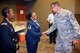 At center, Master Sgt. Kimberly Lawhorn, an Airman with the 932nd Airlift Wing, 932nd Maintenance Squadron, is thanked and congratulated by 932nd AW Command Chief Master Sgt. Chad Welch, following her retirement ceremony as she leaves the Illinois unit and Air Force Reserve Command. The 932nd honor guard told the history of the flag and folded it as part of the event held July 8, 2017 at Scott Air Force Base, Illinois. (U.S. Air Force photo by Lt. Col. Stan Paregien) 