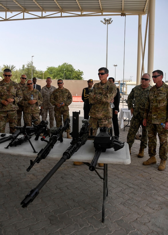 Abu Dhabi, UAE--U.S. Army Gen Joseph L. Votel, commander United States Central Command, and Command Sergeant Major William F. Thetford (far right) receive a mission brief and weapons demonstration from Special Operations Command Central (SOCCENT) personnel July 21, 2017. Votel and other senior leaders observed joint Special Operations Force specific training highlighting the unique skills and capabilities special forces bring to the USCENTCOM area of responsibility. (Department of Defense photo by U.S. Air Force Tech Sgt. Dana Flamer) 