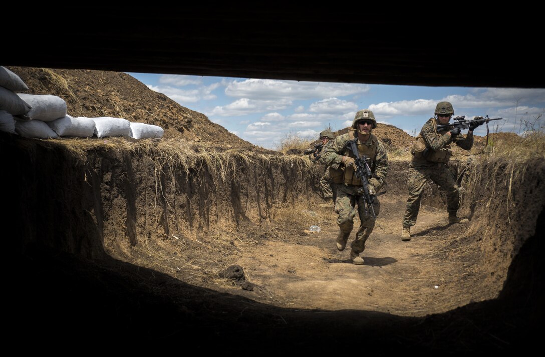 U.S. Marines with 3rd Battalion, 23rd Marine Regiment, run to a defensive position during training July 15, in Shirokyi Lan, Ukraine, as part of exercise Sea Breeze 2017.  Sea Breeze is a U.S. and Ukraine co-hosted multinational maritime exercise held in the Black Sea and is designed to enhance interoperability of participating nations and strengthen maritime security within the region. (U.S. Marine Corps photo by Staff Sgt. Marcin Platek/Released)