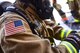 Staff Sgt. Blaine Erway, 99th Civil Engineer Squadron firefighter crew chief, prepared his gear before ascending the air traffic control tower at Nellis Air Force Base, Nev., July 18, 2017. The air traffic control tower is the center of operations for aircraft control. (U.S. Air Force photo by Airman 1st Class Andrew D. Sarver/Released)