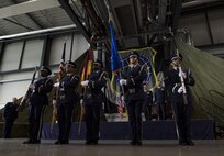 Airmen participating in the Ramstein Base Honor Guard program post the colors during a change of command ceremony on Ramstein Air Base, Germany, July 20, 2017. The base honor guard is a volunteer position that provides Airmen the opportunity to challenge themselves professionally, personally, and mentally. (U.S. Air Force photo by Senior Airman Tryphena Mayhugh)