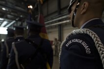 U.S. Air Force Airman 1st Class Don Royal Two Elk, Ramstein Base Honor Guardsman and 86th Aerospace Medicine Squadron bioenvironmental engineering technician, stands in formation with other honor guardsmen during a change of command ceremony on Ramstein Air Base, Germany, July 20, 2017. The Ramstein Base Honor Guard is a volunteer position with a one-year contract. (U.S. Air Force photo by Senior Airman Tryphena Mayhugh)